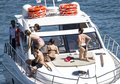Selena Gomez wearing a bikini on a boat