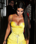 Kim Kardashian flashes her cleavage in public