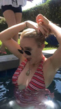 Emily Osment loves showing off her boobs