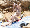 Emma Watson sunbathing topless in Ibiza (6/2022)