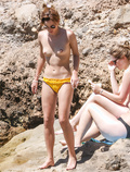 Emma Watson sunbathing topless in Ibiza (6/2022)
