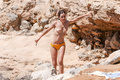 Emma Watson sunbathing topless in Ibiza (6/2022)