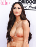 Nicole Scherzinger boobs burst out of dress
