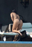Kourtney Kardashian shows sexy bikini ass