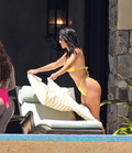 Kourtney Kardashian shows sexy bikini ass