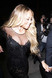 Mariah Carey stuns as cleavage erupts