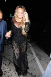 Mariah Carey stuns as cleavage erupts