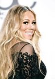 Mariah Carey stuns as cleavage erupts