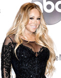 Mariah Carey stuns as cleavage erupts