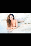 Kelly Brook goes completely nude