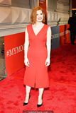 Redhead Jessica Chastain in red dress at red carpet