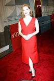 Redhead Jessica Chastain in red dress at red carpet