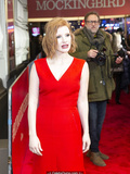 Redhead Jessica Chastain in red dress at red carpet