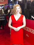 Redhead Jessica Chastain in red dress at red carpet