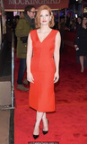 Redhead Jessica Chastain in red dress at red carpet