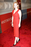 Redhead Jessica Chastain in red dress at red carpet