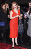 Redhead Jessica Chastain in red dress at red carpet