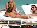 Jesica Cirio areola slip in red bikini on the beach in Miami - October 29, 2012