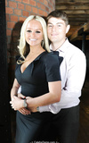 Blonde Jennifer Ellison in tight black dress