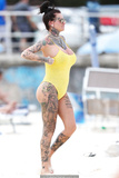 Jemma Lucy pokies in yellow swimsuit on the beach in Sydney - February 28, 2019