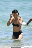 Jamie Chung in black bikini at the beach in Miami - April 27, 2019
