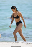Jamie Chung in black bikini at the beach in Miami - April 27, 2019