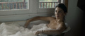 Jamie Gray Hyder naked in a bathtub at Better Days (2019)