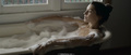 Jamie Gray Hyder naked in a bathtub at Better Days (2019)