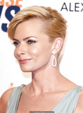 Blonde Jaime Pressly cleavage in long gray dress