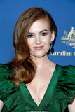 Isla Fisher cleavage in green dress at 2019 Australians In Film Awards in Los