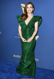 Isla Fisher cleavage in green dress at 2019 Australians In Film Awards in Los