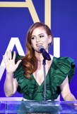 Isla Fisher cleavage in green dress at 2019 Australians In Film Awards in Los