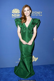 Isla Fisher cleavage in green dress at 2019 Australians In Film Awards in Los