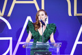 Isla Fisher cleavage in green dress at 2019 Australians In Film Awards in Los