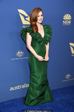 Isla Fisher cleavage in green dress at 2019 Australians In Film Awards in Los