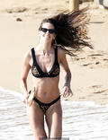 Izabel Goulart in black bikini on the beach in Mykonos - June 27, 2019