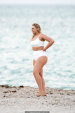 Iskra Lawrence in white bikini during a photoshoot at Miami Beach - March 25,