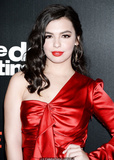 Isabella Gomez in short red dress