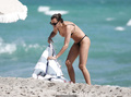 Irina Shayk nipple slip in black bikini at the beach in Miami - March 07, 2019