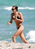 Irina Shayk nipple slip in black bikini at the beach in Miami - March 07, 2019