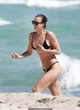 Irina Shayk nipple slip in black bikini at the beach in Miami - March 07, 2019