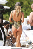 Doutzen Kroes in leopard swimsuit on the beach in Miami - March 29, 2019