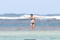 Drew Barrymore in green bikini in Hawaii for her 32nd birthday - February 22,