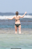 Drew Barrymore in green bikini in Hawaii for her 32nd birthday - February 22,