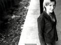 English singer and songwriter Dido in jeans and red blouse for Pat Pope
