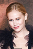 Danika Yarosh wears a stunningly low cut black dress