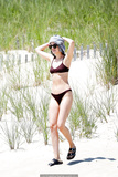 Dakota Johnson and Chris Martin enjoyed a day of sun and fun in the Hamptons -