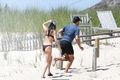 Dakota Johnson and Chris Martin enjoyed a day of sun and fun in the Hamptons -