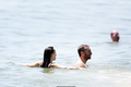 Dakota Johnson and Chris Martin enjoyed a day of sun and fun in the Hamptons -