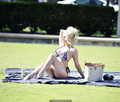 Busty blonde Courtney Stodden - bikinis, a dog and a blunt in a park in LA -